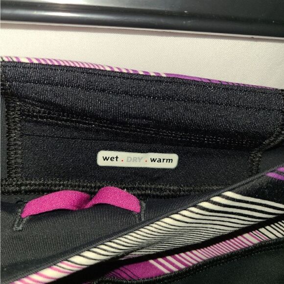 Lululemon Wet Dry Warm Purple Black Leggings Size 2 - Picture 3 of 6